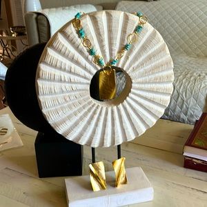 A unique imported turquoise with gold plated set
